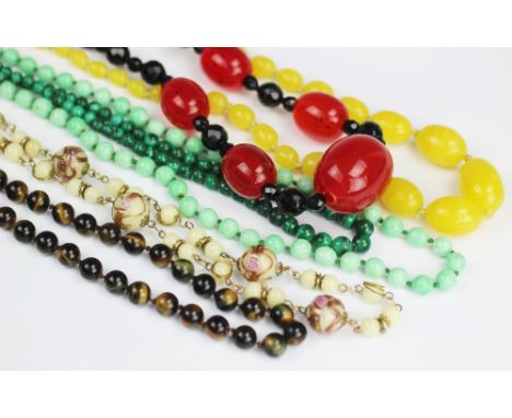 A collection of assorted bead necklaces, to include; a jade coloured bead necklace and a pair of matching drop earrings, a 'w