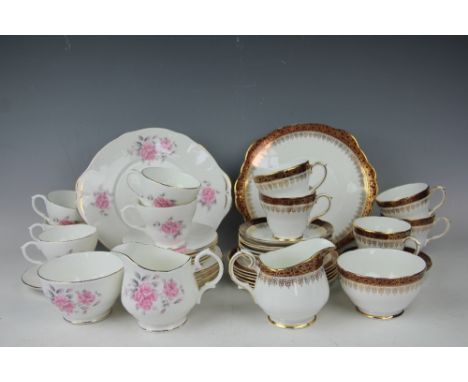 A Duchess Winchester pattern tea service comprising; twelve teacups and saucers, twelve plates, a sugar bowl, milk jug and a 