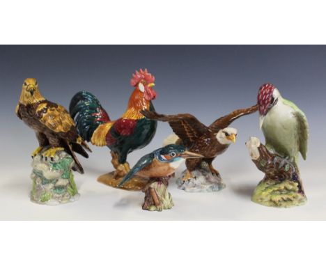 A Beswick model of a woodpecker, 1218, 22cm, with a model of a kingfisher, also with a leghorn and a bald eagle 1018 (the lat