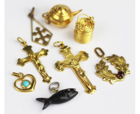 A collection of assorted yellow metal charms, to include; a basket enclosing kettle stamped 14k, a teapot stamped 14k, a shoe