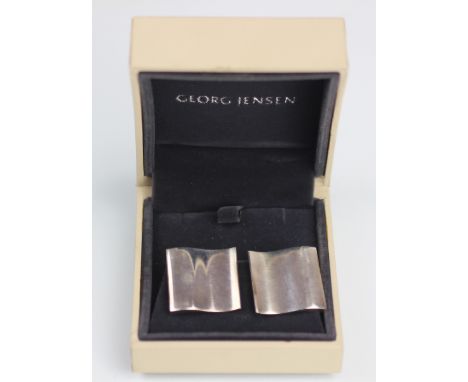 A pair of Gerog Jensen silver clip earrings, model number 432 ND, of plain polished square form, 2.3cm wide, 20.3gms gross, w