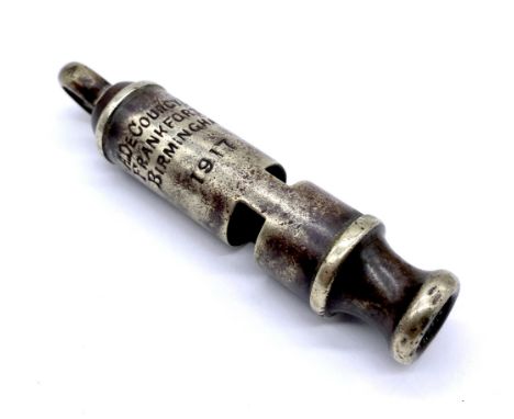 A WW1 whistle marked with a broad arrow stamp and A.De Courcy &amp; Co, Frankfort St, Birmingham, 1917