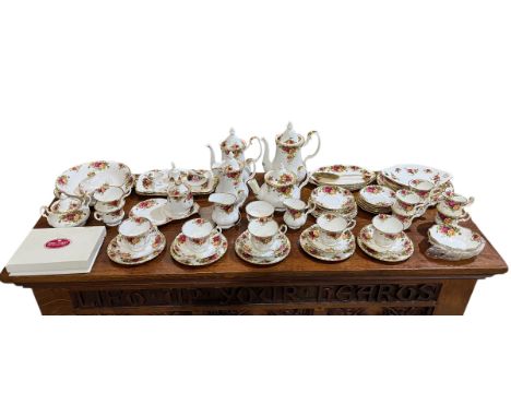 A large collection of Royal Albert Old Country Roses tableware including teapot, coffee pots, jugs, plates, teacups, cake sta