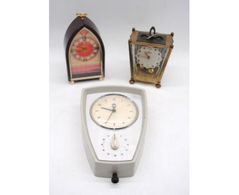 Three vintage clocks, including a Smith's kitchen wall clock, Korma, Seiko etc.