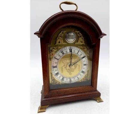 A Garrard's London mahogany cased bracket clock on brass bracket feet, 17cm wide 23cm high.