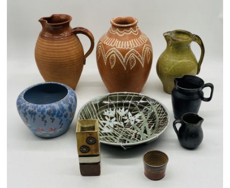 A collection of studio pottery including Roger Cockram, Geoffrey Whiting, assorted other vases, bowl, jug etc