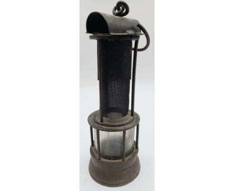 A John Mills Clanny style miner's lamp with screw lock and open gauze.