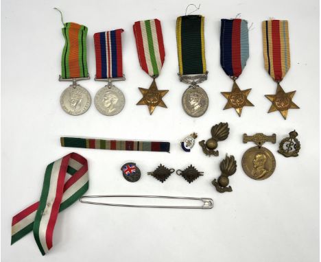 A collection of five WWII medals along with a Territorial Army "For Efficient Service" medal awarded to 89593 CFN (Craftsman)