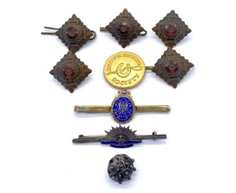 A vintage Norwegian silver David Anderson tie clip, an Australian commonwealth military forces bar brooch, various buttons et