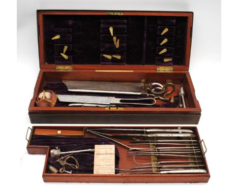 An Evans & Wormull cased field surgeons operation/amputation kit, containing various tools marked 'Arnold & Sons, London' ove