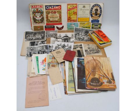 A quantity of various ephemera, including an album of vintage alcohol labels, Scout badges, Cunard Line menus, photographs, p
