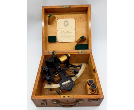A 1942 Hezzanith instrument works sextant in oak case.