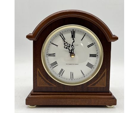 A London Clock Company mantle clock with Westminster Chime and battery powered quartz movement
