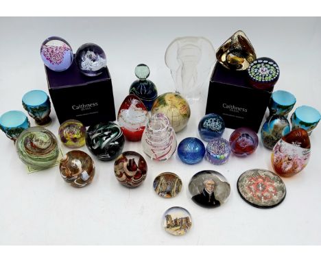 A collection of assorted glass paperweights to include Caithness, Allum Bay, Langham, Mdina etc.