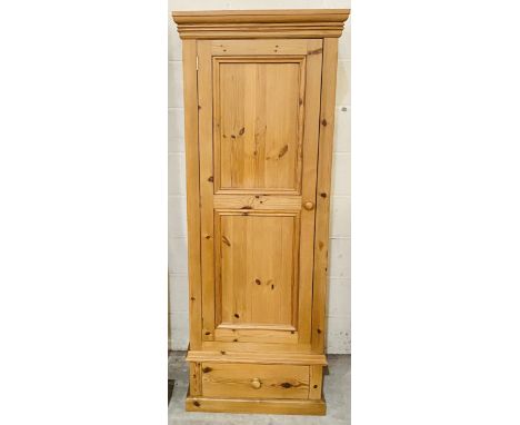 A single pine wardrobe with drawer under - height 178cm, width 68cm, depth 56cm