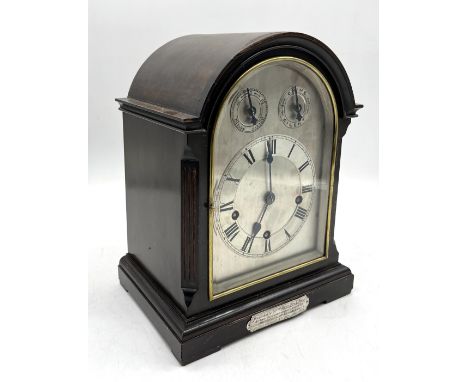A domed mahogany cased Edwardian bracket clock, likely by Winterhalder & Hofmeier, with pierced rear panel 