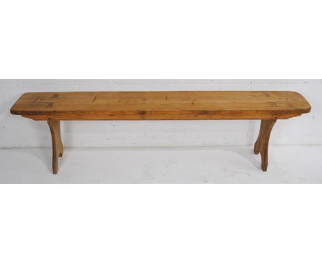 An antique rustic pine bench - length 172.5cm, depth 25.5cm, height 45.5cm