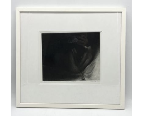 A Marina Kim mezzotint print "Claire Reading" of a nude female, signed and numbered 98/120