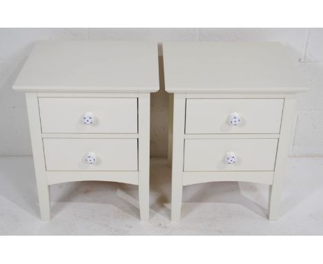 A pair of modern bedside cabinets, each with two drawers and ceramic handles - length 47.5cm, depth 43cm, height 58.5cm