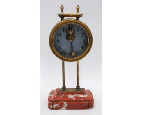 A Watson keyless brass mantle clock, on onyx base