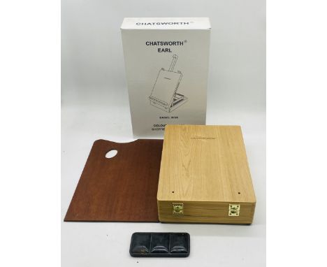A boxed Chatsworth Earl artist easel box, along with a Reeves Student watercolour paint tin