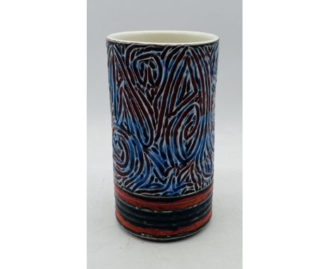 A vintage Poole Pottery carved Delphis vase - height 23cm