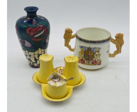 An unboxed Moorcroft "Mackintosh" pattern vase designed by Rachel Bishop (1995 - A/F chip to rim, height 15cm), along with Ro