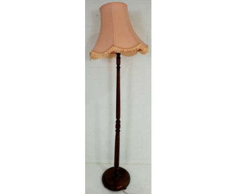A standard lamp and shade.