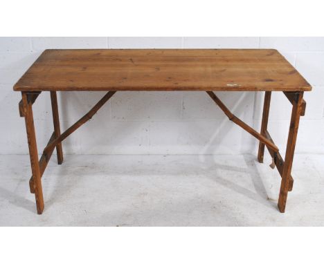 A vintage rustic pine trestle table stamped Boulton & Paul Ltd 1956 - length 136cm, depth 68cm, height 72cm