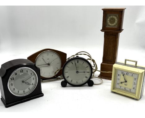 A collection of vintage alarm and other clocks including Smiths miniature grandfather clock, Metamec etc.