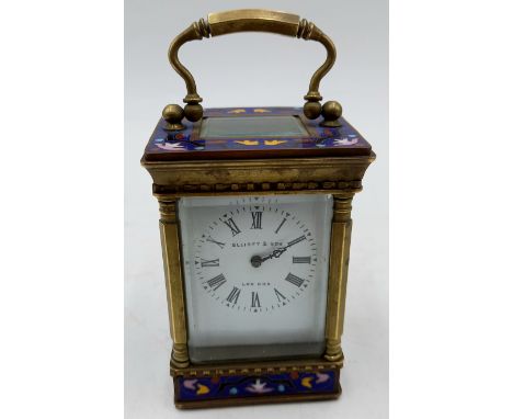 A Miniature brass carriage clock with cloisonne decoration, Elliott & Son London, 6cm wide, 9cm high.