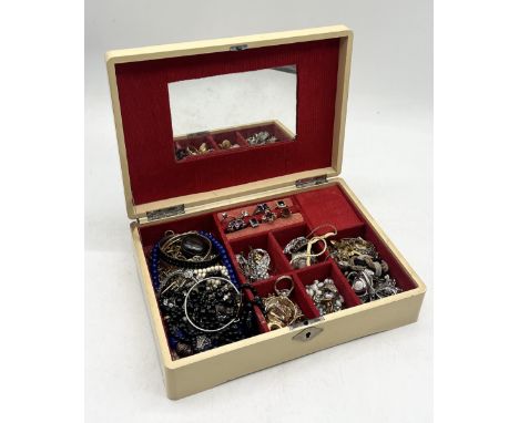 A collection of vintage costume jewellery, rings, beads etc.