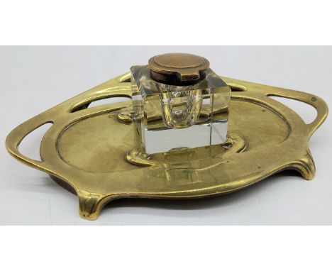 An Art Nouveau bronze inkstand with crystal and bronze inkwell with Geschutz stamp - 23cm wide, 17cm deep.