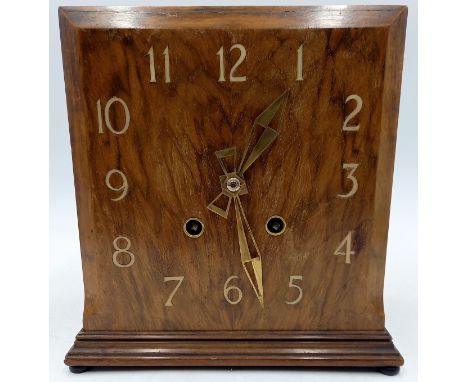 A Bravington walnut cased mantle clock with inlaid numerals, on bun feet, 21cm wide, 22cm high.