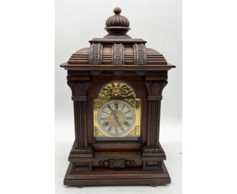 An antique German mantle clock, height 50cm
