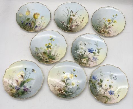 A set of eight Royal Worcester hand painted plates all with floral designs, 20cm diameter
