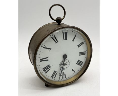 A French brass barrel alarm clock, 14 cm diameter.