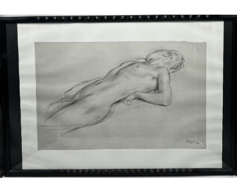 A large framed Degas print of a reclining nude