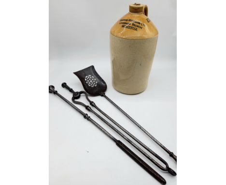 A Worcester stoneware flagon and a set of three antique steel fire irons.