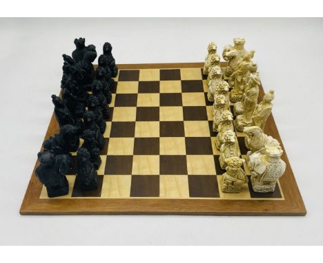 A vintage chess set with Chinese style pieces and wooden board - one piece A/F