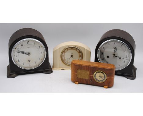 Two vintage Smith's Enfield bakelite mantle clocks, with keys, along with another small Smith's bakelite clock and a 'Peter' 