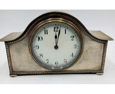 A Swiss silver plated, platform movement, mantle clock, 12cm high
