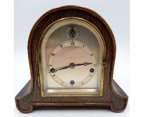A Gustav Becker oak cased Westminster chime mantle clock, 20cm wide 19cm high.