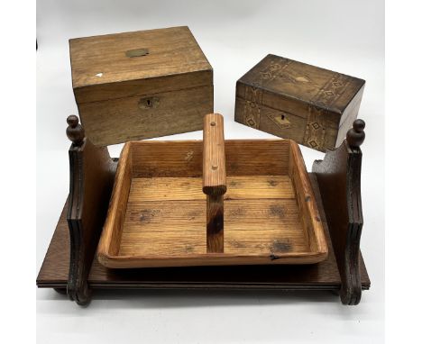 A collection of items comprising an antique writing slope, sliding bookshelf, wooden trug etc.