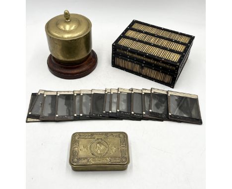 A collection of various items including magic lantern slides of Russian sites, Queen Mary tin, quill box, various cigarette c