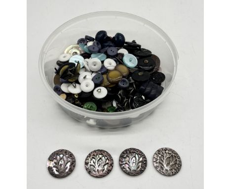 A collection of assorted vintage buttons.