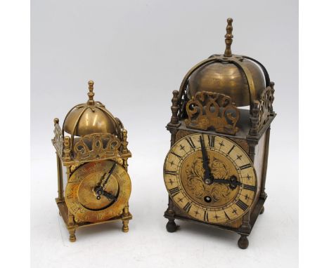 A Smith's brass lantern clock, along with an Empire brass lantern clock