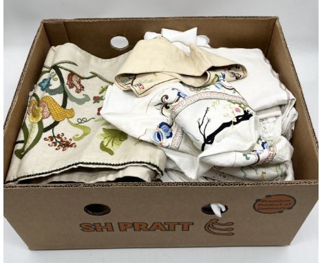 A quantity of vintage linens and embroidery work 