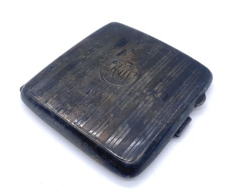 A Birmingham silver 1924 cigarette case with engine turned decoration, weight 89g. 