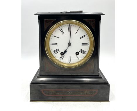 A late Victorian slate mantle clock with Egyptian revival detail to front and hand painted dial